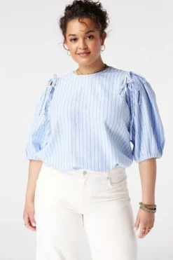 Blouse à carreaux avec manches bouffantes