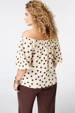 Blouse à pois épaules dénudées