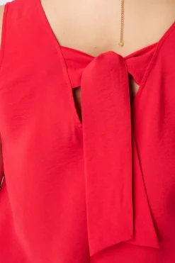 Blouse sans manches avec fermeture à nœud