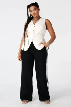 Gilet long avec boutons dorés